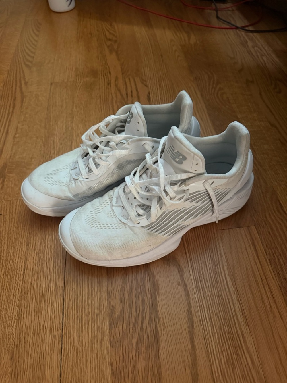 New Balance White Men's Athletic Sneakers with Subtle Gray Accents